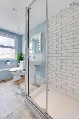 a bathroom with a glass shower and a toilet at 2 Bed in Marazion oc-p00598 in Marazion