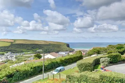 a view of a road and the ocean at 4 Bed in Mawgan Porth oc-p00608 in Mawgan Porth