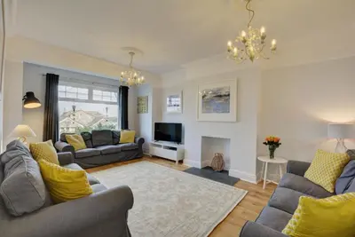 a living room with two couches and a television at 5 Bed in Padstow oc-p00628 in Padstow
