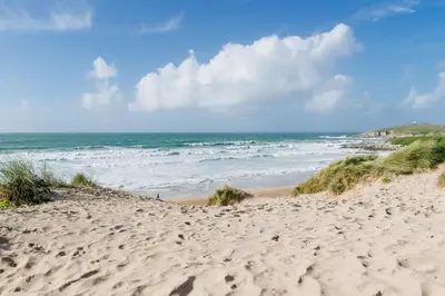 a sandy beach with the ocean in the background at 3 Bed in Newquay oc-p00631 in Newquay