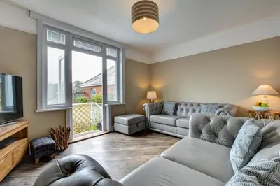 a living room with a couch and a tv at 2 Bed in Padstow oc-p00632 in Padstow