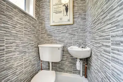 a bathroom with a toilet and a sink at 2 Bed in Padstow oc-p00632 in Padstow