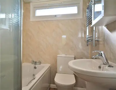 a bathroom with a toilet and a sink and a bath tub at 2 Bed in St. Merryn oc-p00673 in St Merryn