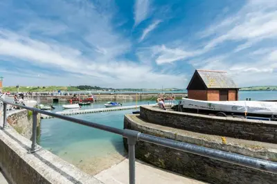 a body of water with boats in a harbor at 1 Bed in Padstow oc-p00685 in Padstow