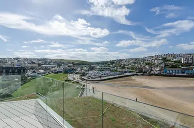 a view of the beach from the roof of a building at 3 Bed in Perranporth oc-p00695 in Perranporth