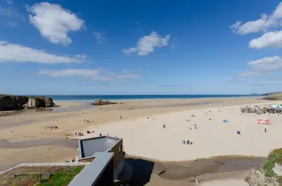 a beach with a lot of people on it at 3 Bed in Perranporth oc-p00695 in Perranporth