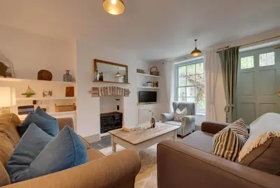 a living room with two couches and a table at 2 Bed in Polruan oc-p00697 in Fowey