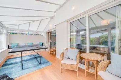 a living room with a table and chairs at 3 Bed in St. Merryn oc-p00700 in St Merryn