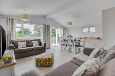 a living room with a couch and a table at 3 Bed in St. Merryn oc-p00701 in St Merryn