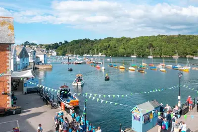 a group of boats in a body of water at 2 Bed in Fowey oc-p00708 in Fowey