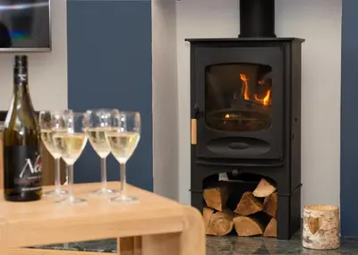 a room with wine glasses and a stove at 4 Bed in Newquay oc-p00709 in Newquay