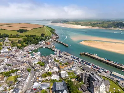 an aerial view of a town next to a body of water at 3 Bed in Trevone oc-p00723 in Padstow