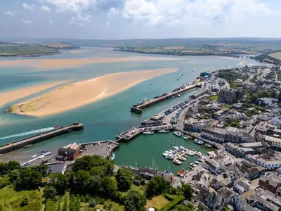 an aerial view of a harbor next to a beach at 1 Bed in Padstow oc-p00735 in Padstow