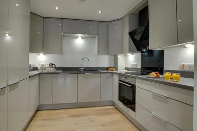 a kitchen with white cabinets and a sink at 3 Bed in Padstow oc-p00742 in Padstow