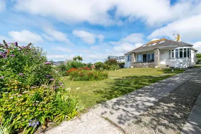 a house with a garden in front of it at 3 Bed in Trevone oc-p00758 in St Merryn