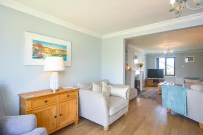a living room with a couch and a table at 4 Bed in Padstow oc-p00759 in Padstow