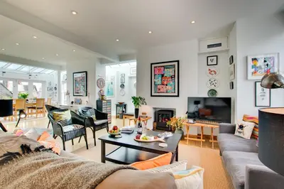 a living room with a couch and a table at 3 Bed in Padstow oc-p00797 in Padstow