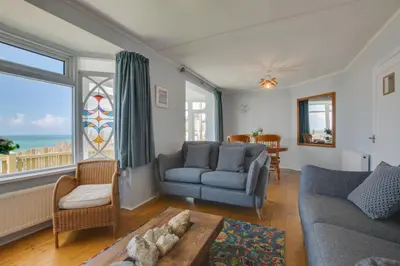 a living room with a couch and a table at 3 Bed in Porthleven oc-p00877 in Porthleven