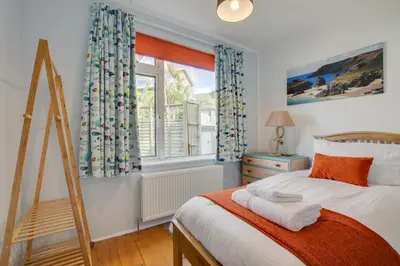 a bedroom with a bed and a window at 3 Bed in Porthleven oc-p00877 in Porthleven