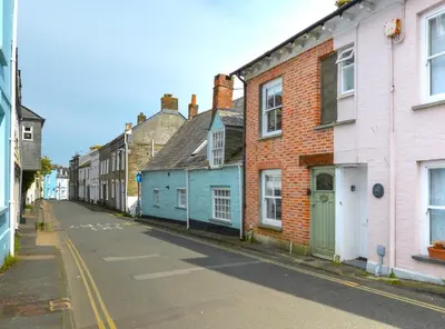 an empty street with a row of houses at 3 Bed in Padstow oc-p00807 in Padstow