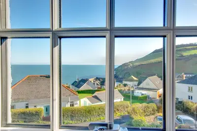 a view of the ocean from a window at 3 Bed in Gorran Haven oc-p00812 in Gorran Haven