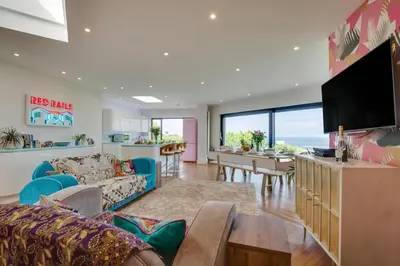 a living room with a couch and a tv at 5 Bed in Newquay oc-p00894 in Newquay