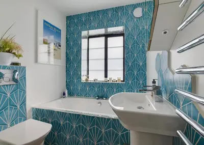 a bathroom with a tub and a sink and a toilet at 5 Bed in Newquay oc-p00894 in Newquay