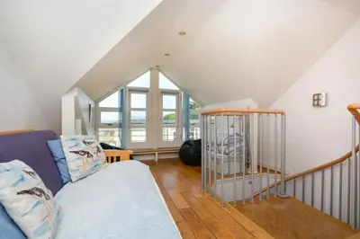a living room with a couch and a window at 1 Bed in St. Ives oc-pc1010 in St Ives