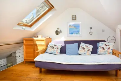 a bedroom with a bed in a attic at 1 Bed in St. Ives oc-pc1010 in St Ives