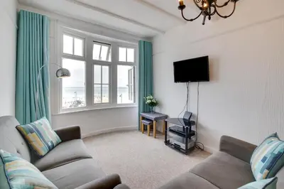 a living room with a couch and a flat screen tv at 2 Bed in St Ives oc-pc055a in St Ives