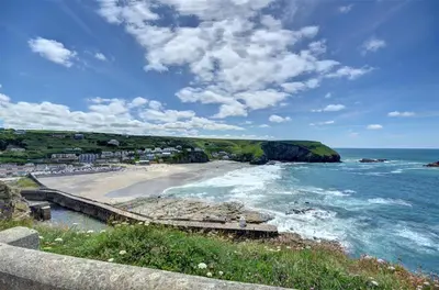 a view of a beach with the ocean at 3 Bed in Portreath oc-pc054 in Portreath