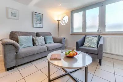 a living room with a couch and a table at 2 Bed in St. Ives oc-pc446c in St Ives