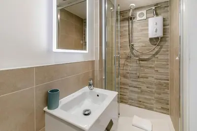 a bathroom with a sink and a shower at 2 Bed in St. Ives oc-pc446c in St Ives