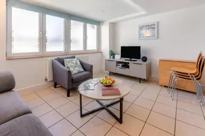a living room with a couch and a table at 2 Bed in St. Ives oc-pc446c in St Ives