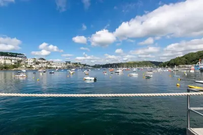 a harbor filled with lots of boats on the water at 4 Bed in Polruan oc-scroft in Fowey