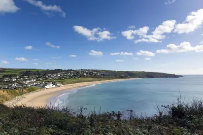 a view of a beach from a hill at 5 Bed in Praa Sands oc-seacro in Praa Sands
