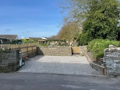 a yard with a fence and a retaining wall at 2 Bed in St. Teath oc-shilli in Saint Teath