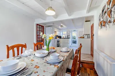 a dining room with a table and chairs at 3 Bed in St. Issey oc-v27518 in Saint Issey