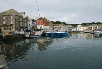 a group of boats are docked in a harbor at Owl House in Wadebridge
