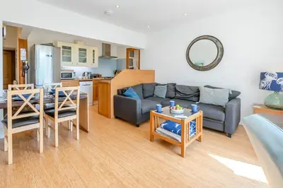 a living room with a couch and a table at 2 Bed in St. Ives oc-6carr in St Ives