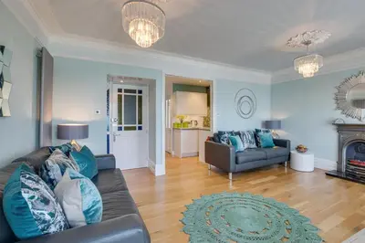 a living room with a couch and a fireplace at 1 Bed in St. Ives oc-aqua19 in St Ives