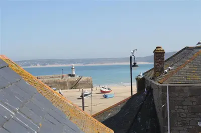 a view of a beach and the ocean from a building at 3 Bed in St Ives oc-bail05 in St Ives