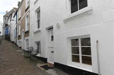 a row of white buildings on a street at 3 Bed in St Ives oc-bail06 in St Ives