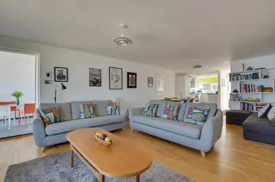a living room with two couches and a table at 2 Bed in St Ives oc-bpp15 in St Ives