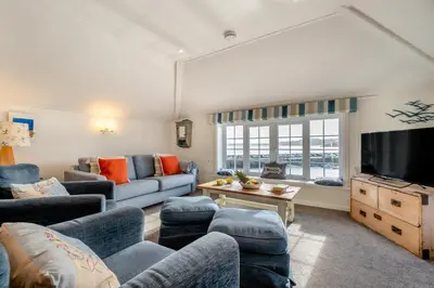 a living room with a couch and a tv at 2 Bed in St Ives oc-chyr03 in St Ives