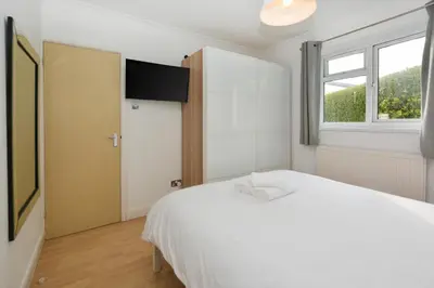 a bedroom with a white bed and a window at 1 Bed in St Ives oc-clear2 in St Ives