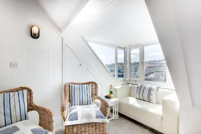 a living room with a couch and two chairs at 1 Bed in St. Ives oc-cp5 in St Ives