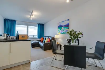 a living room with a couch and a table at 1 Bed in St Ives oc-cwn31 in St Ives