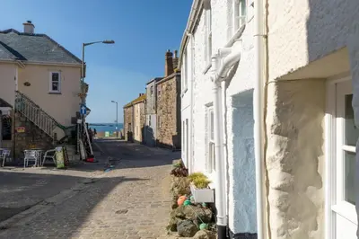 an empty street in a small town with houses at 1 Bed in St Ives oc-dgy028 in St Ives