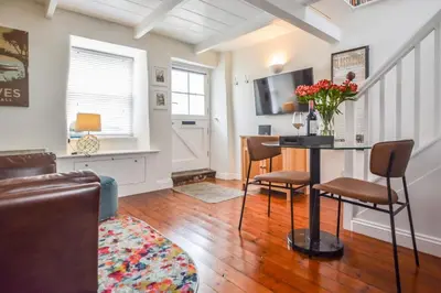 a living room with a table and chairs at 1 Bed in St Ives oc-dgy028 in St Ives